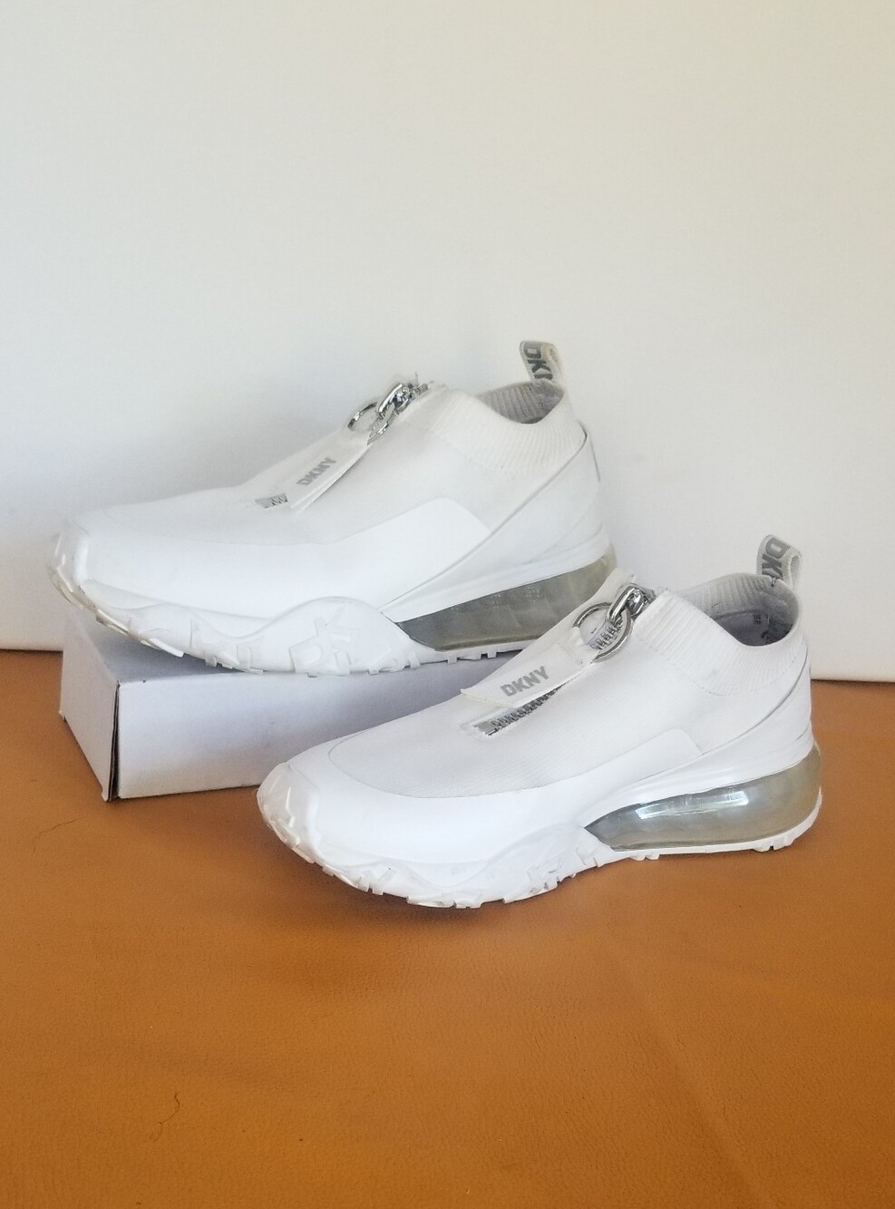 DKNY White Slip-On Sock Sneakers with Silver Heel Accent